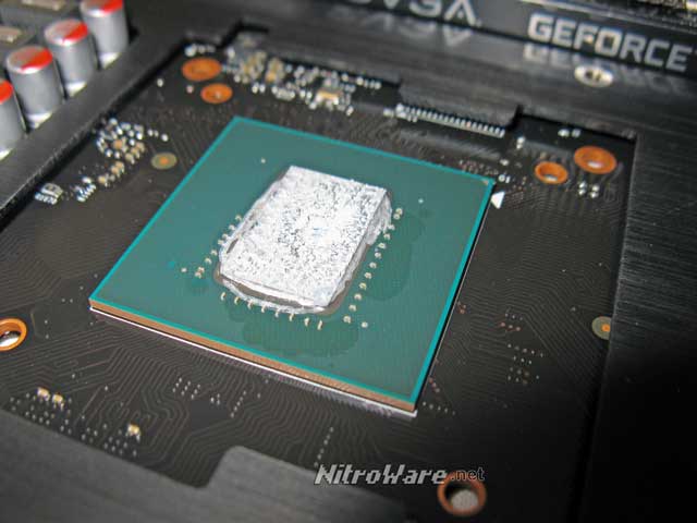NVIDIA Maxwell GM206 GPU as used for GTX 960. The footprint for the larger GM204 chip would likely meet or exceed the four corner marks visible around the die 